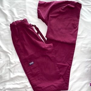 Set of maroon scrubs top and bottom.